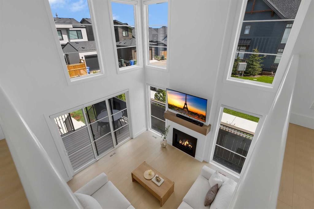 24 Alpine Common Sw, Calgary, AB - Indoor With Fireplace