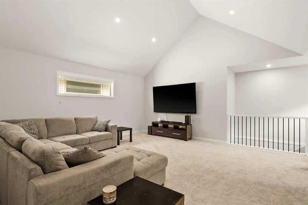 1107 Copperfield Boulevard Se, Calgary, AB - Indoor Photo Showing Living Room