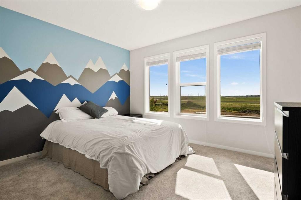 1107 Copperfield Boulevard Se, Calgary, AB - Indoor Photo Showing Bedroom
