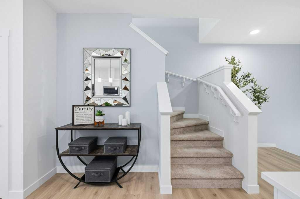 55 Heritage Manor, Cochrane, AB - Indoor Photo Showing Other Room