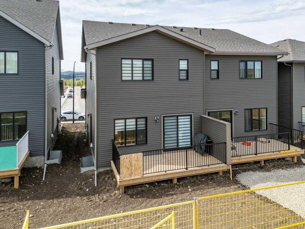 55 Heritage Manor, Cochrane, AB - Outdoor With Deck Patio Veranda