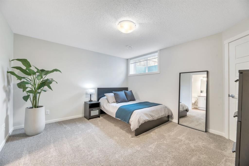 314 Cranbrook Square Se, Calgary, AB - Indoor Photo Showing Bedroom
