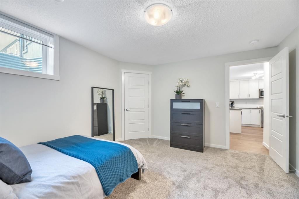 314 Cranbrook Square Se, Calgary, AB - Indoor Photo Showing Bedroom
