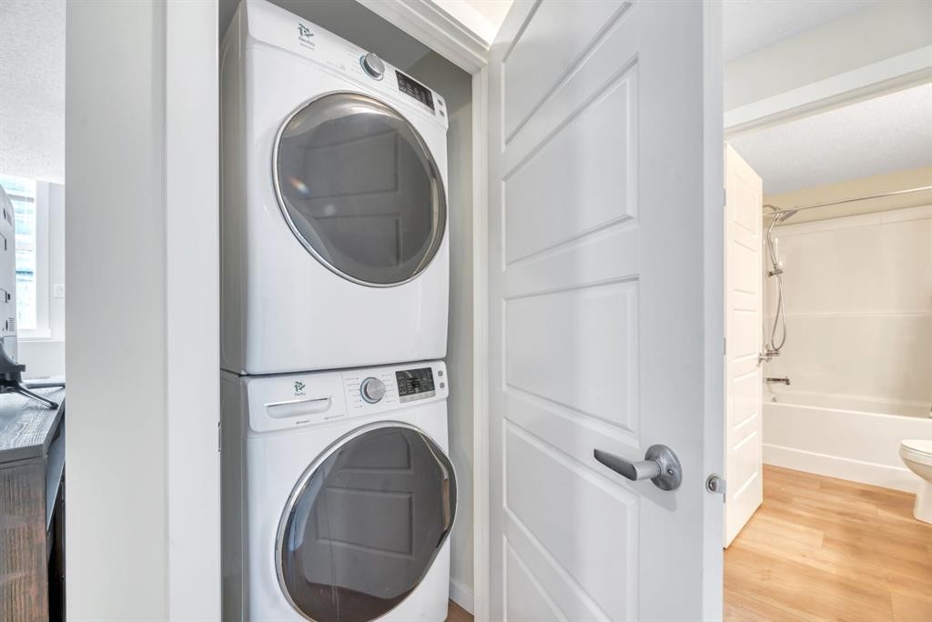 314 Cranbrook Square Se, Calgary, AB - Indoor Photo Showing Laundry Room