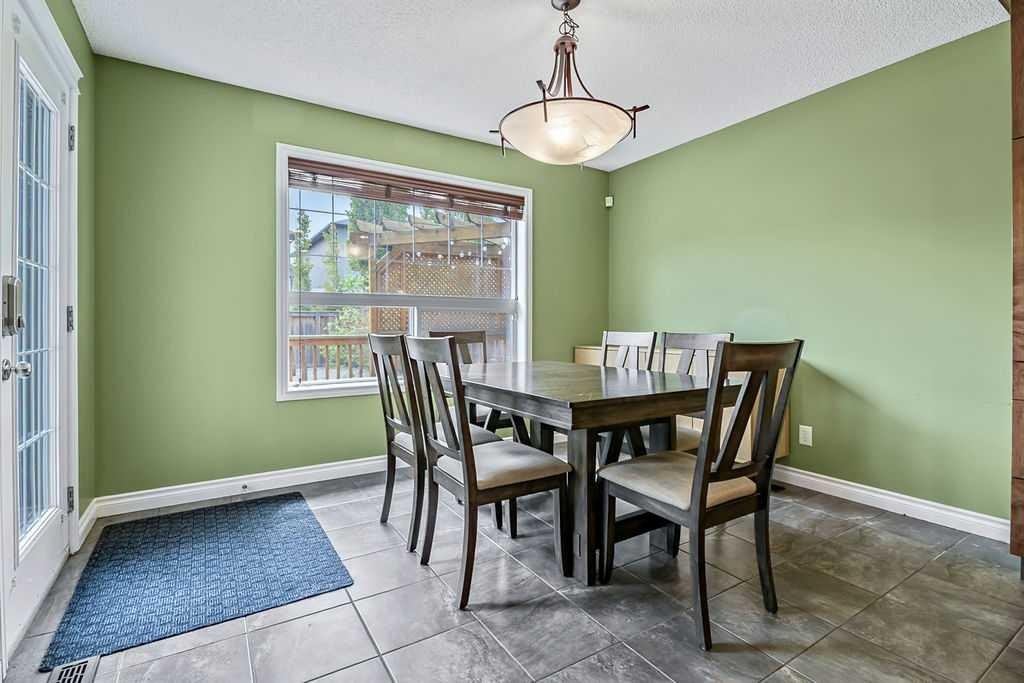 158 New Brighton Lane Se, Calgary, AB - Indoor Photo Showing Dining Room