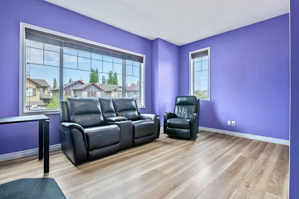 158 New Brighton Lane Se, Calgary, AB - Indoor Photo Showing Living Room