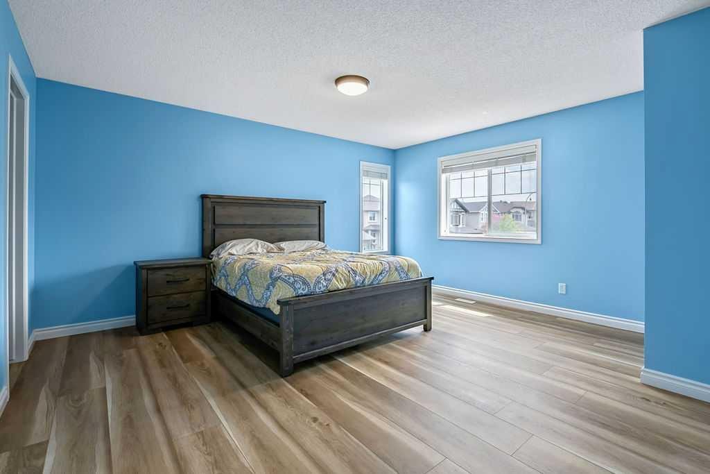 158 New Brighton Lane Se, Calgary, AB - Indoor Photo Showing Bedroom