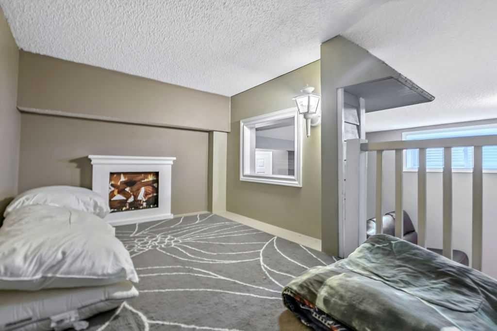 158 New Brighton Lane Se, Calgary, AB - Indoor Photo Showing Bedroom