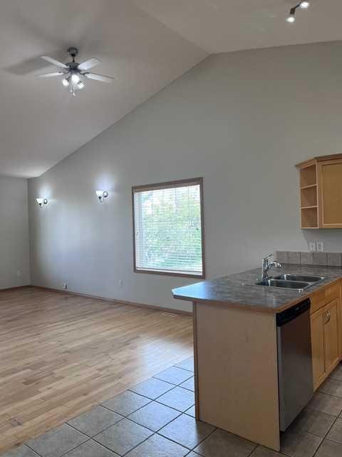 A-4813 49 Street West, Olds, AB - Indoor Photo Showing Kitchen With Double Sink