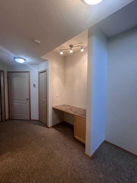 A-4813 49 Street West, Olds, AB - Indoor Photo Showing Other Room