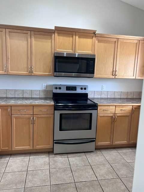 A-4813 49 Street West, Olds, AB - Indoor Photo Showing Kitchen