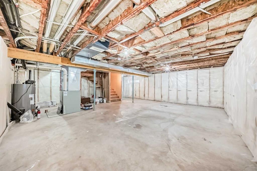 32 Copperleaf Way Se, Calgary, AB - Indoor Photo Showing Basement