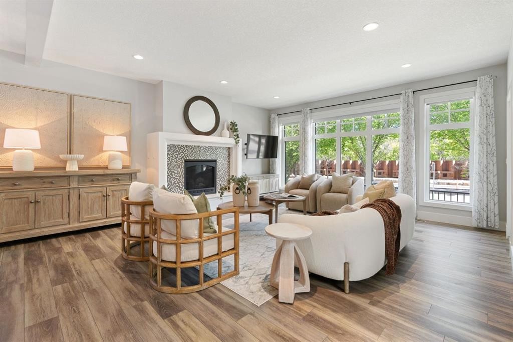 512 Memorial Drive Nw, Calgary, AB - Indoor Photo Showing Living Room With Fireplace
