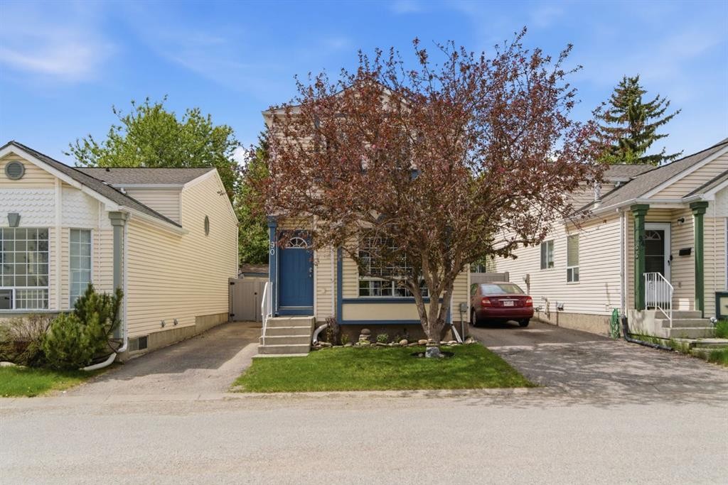 90 Coventry Lane Ne, Calgary, AB - Outdoor With Facade