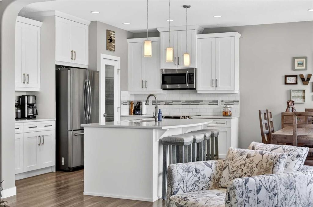 236 Aspenmere Circle, Chestermere, AB - Indoor Photo Showing Kitchen With Upgraded Kitchen