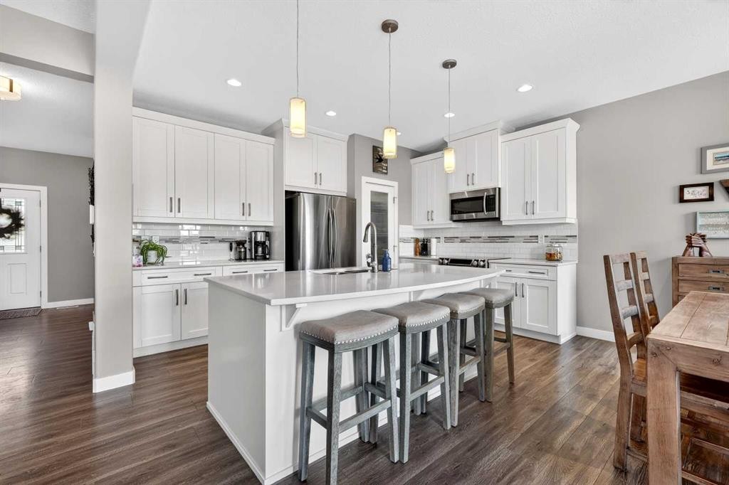 236 Aspenmere Circle, Chestermere, AB - Indoor Photo Showing Kitchen With Upgraded Kitchen