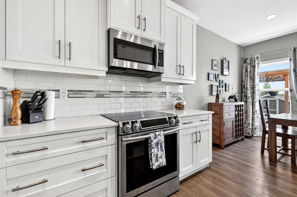 236 Aspenmere Circle, Chestermere, AB - Indoor Photo Showing Kitchen With Upgraded Kitchen