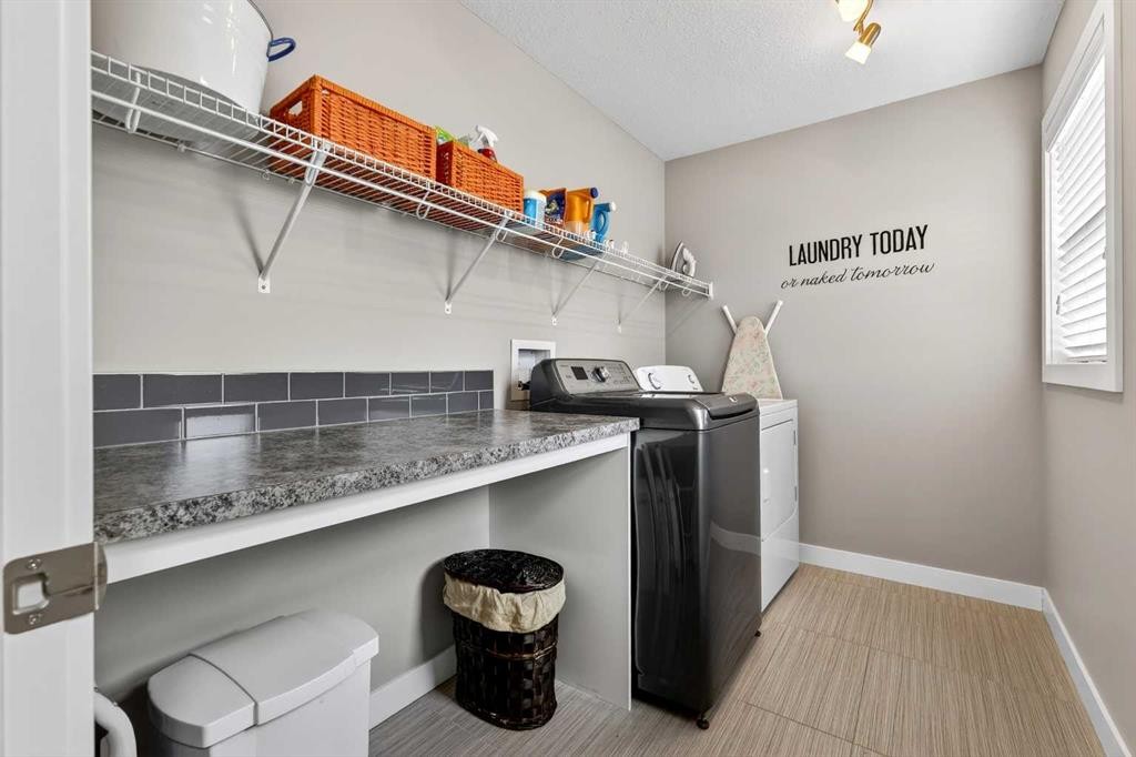 236 Aspenmere Circle, Chestermere, AB - Indoor Photo Showing Laundry Room