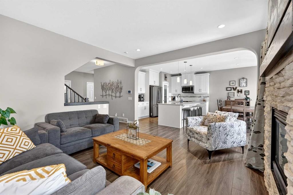 236 Aspenmere Circle, Chestermere, AB - Indoor Photo Showing Living Room With Fireplace