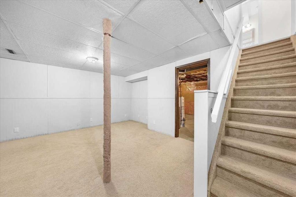 61 Falmere Way Ne, Calgary, AB - Indoor Photo Showing Other Room