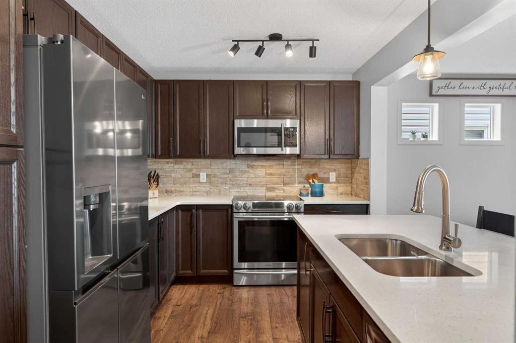 183 Copperpond Street Se, Calgary, AB - Indoor Photo Showing Kitchen With Double Sink With Upgraded Kitchen