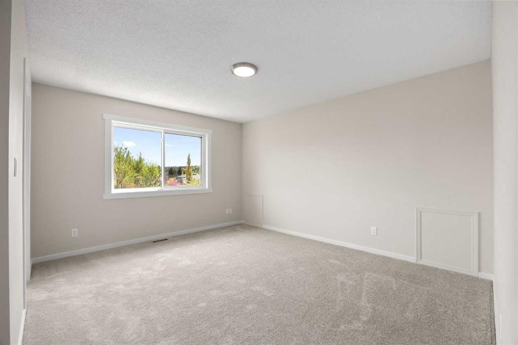 53 Riverview Close, Cochrane, AB - Indoor Photo Showing Other Room