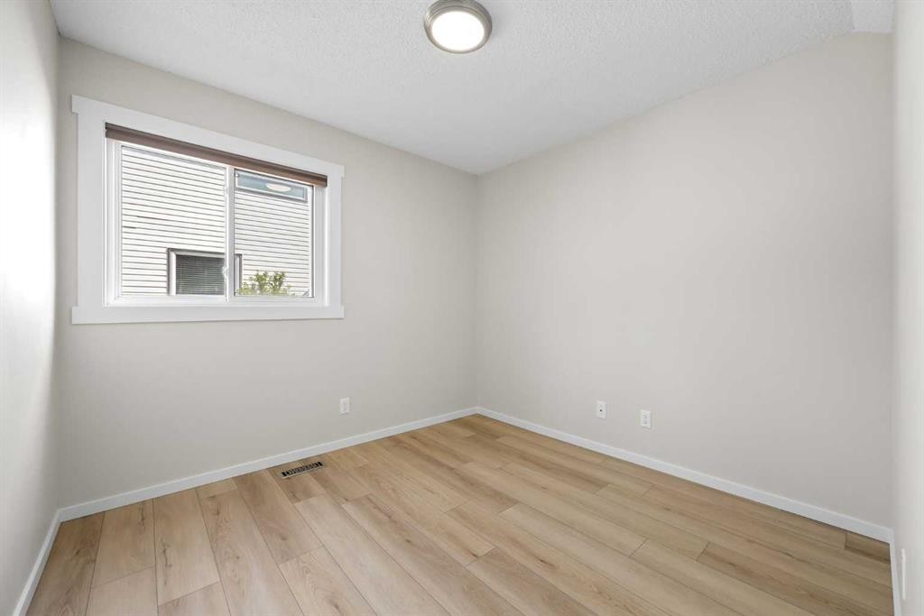 53 Riverview Close, Cochrane, AB - Indoor Photo Showing Other Room