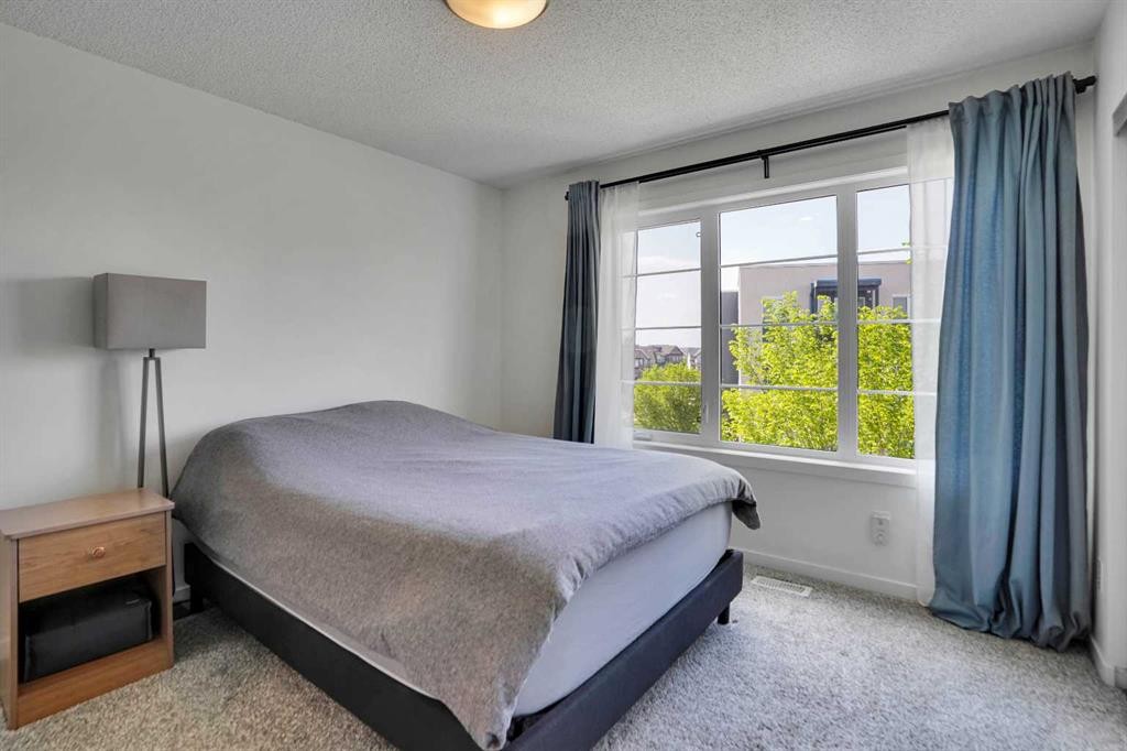 281 Walden Drive Se, Calgary, AB - Indoor Photo Showing Bedroom