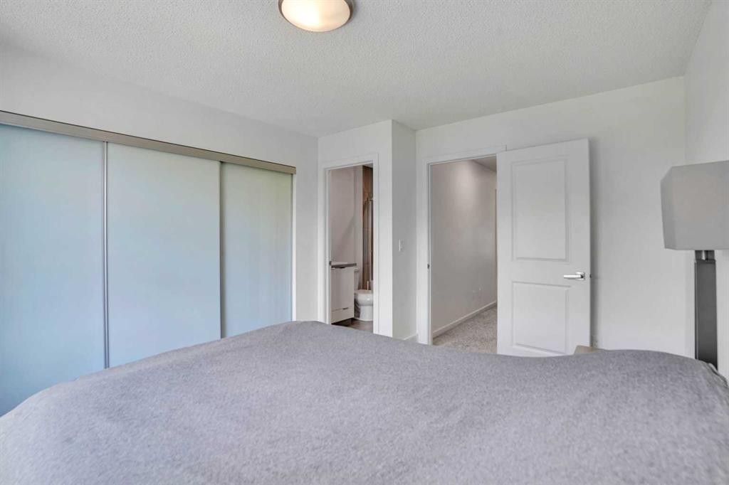 281 Walden Drive Se, Calgary, AB - Indoor Photo Showing Bedroom