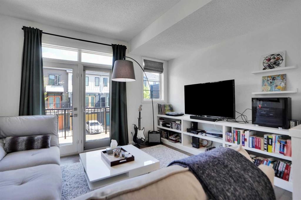 281 Walden Drive Se, Calgary, AB - Indoor Photo Showing Living Room