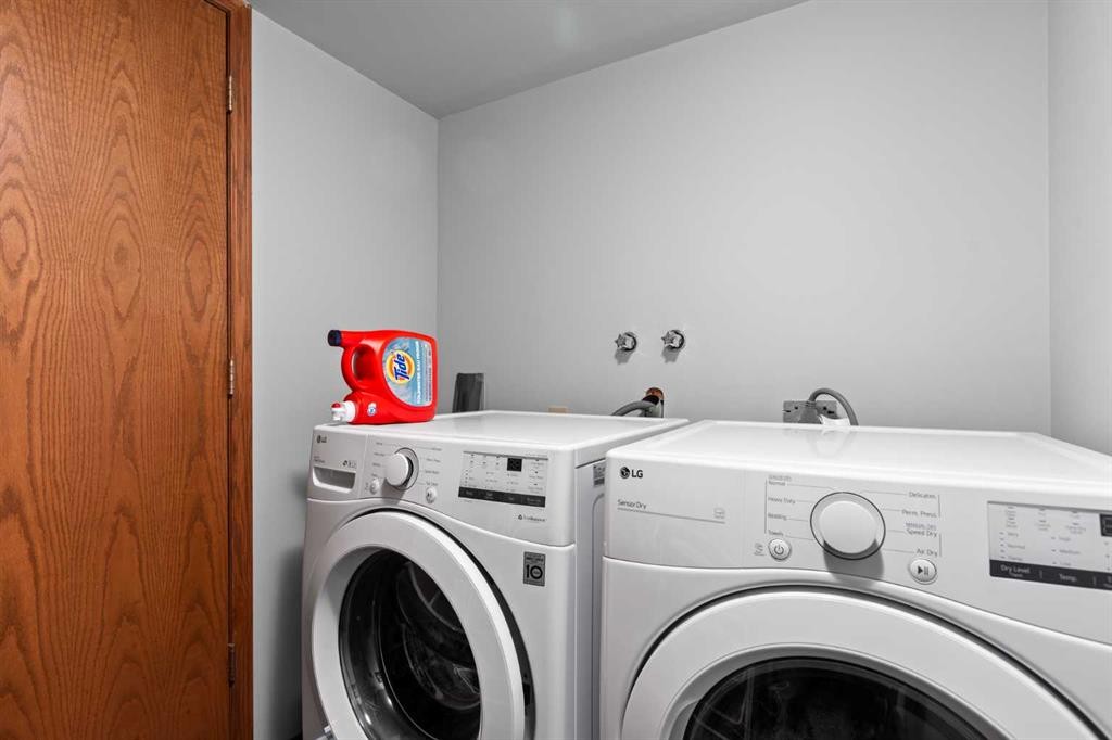 101-410 7 Street Sw, High River, AB - Indoor Photo Showing Laundry Room