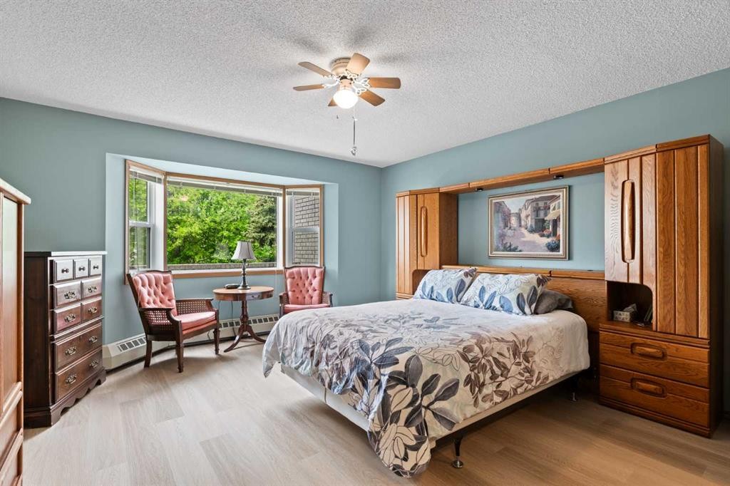 101-410 7 Street Sw, High River, AB - Indoor Photo Showing Bedroom