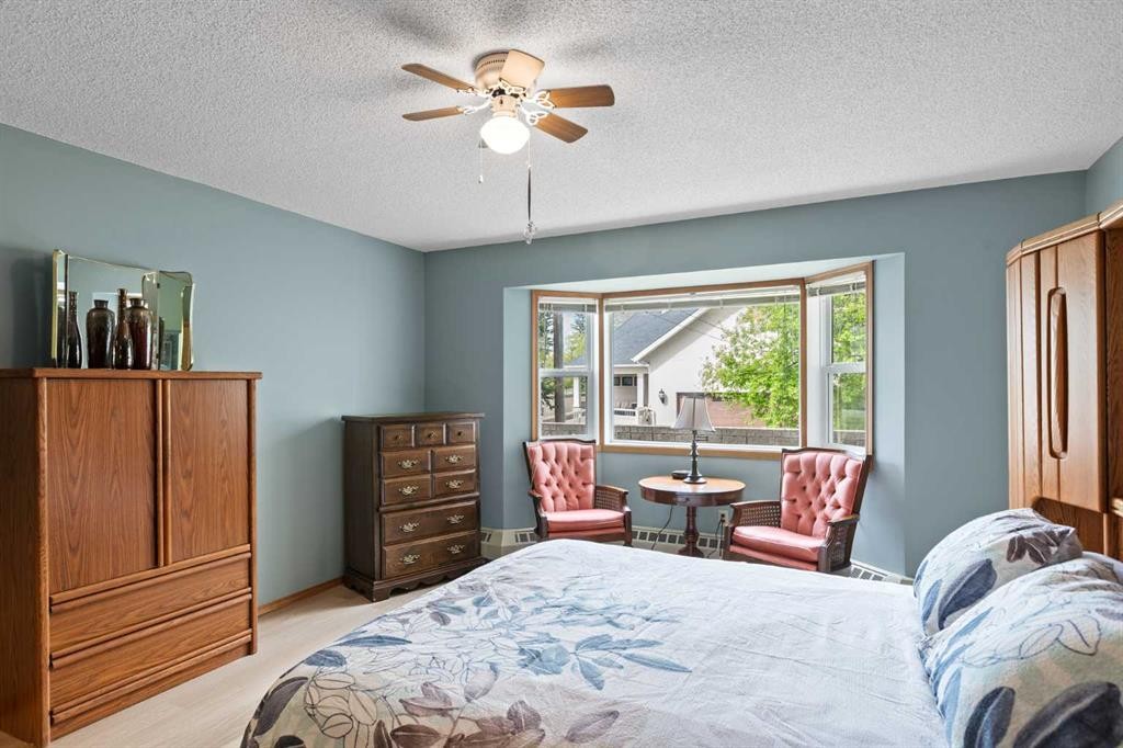 101-410 7 Street Sw, High River, AB - Indoor Photo Showing Bedroom
