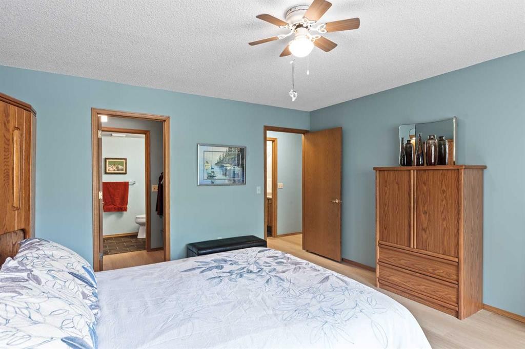 101-410 7 Street Sw, High River, AB - Indoor Photo Showing Bedroom