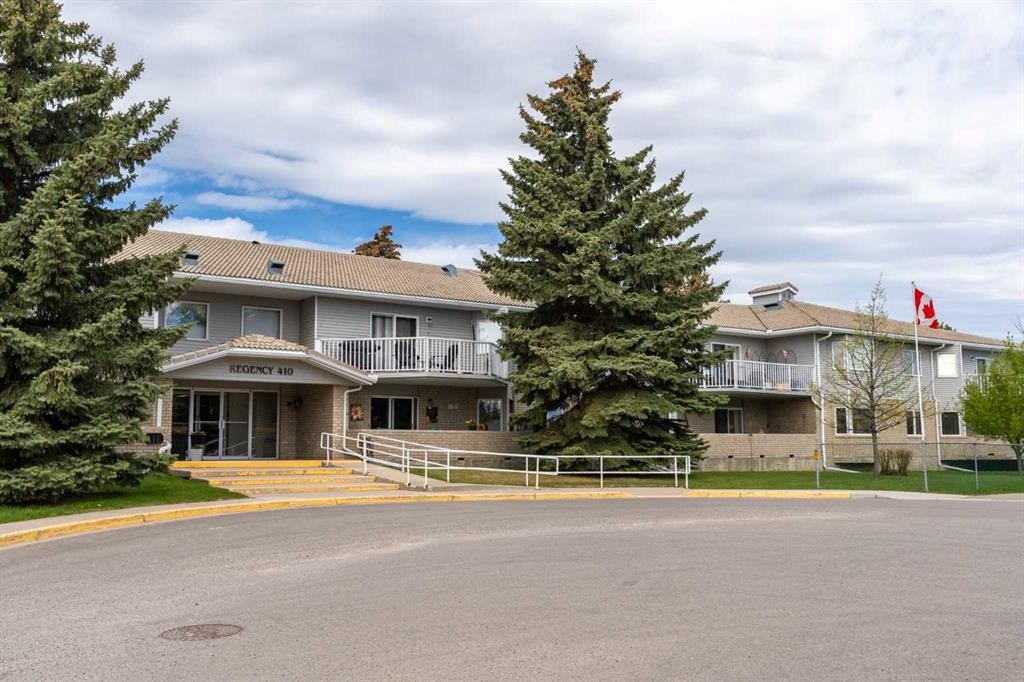 101-410 7 Street Sw, High River, AB - Outdoor With Balcony With Facade