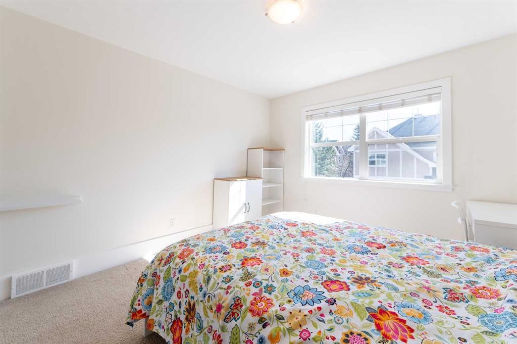 1024 Wentworth Rise Sw, Calgary, AB - Indoor Photo Showing Bedroom