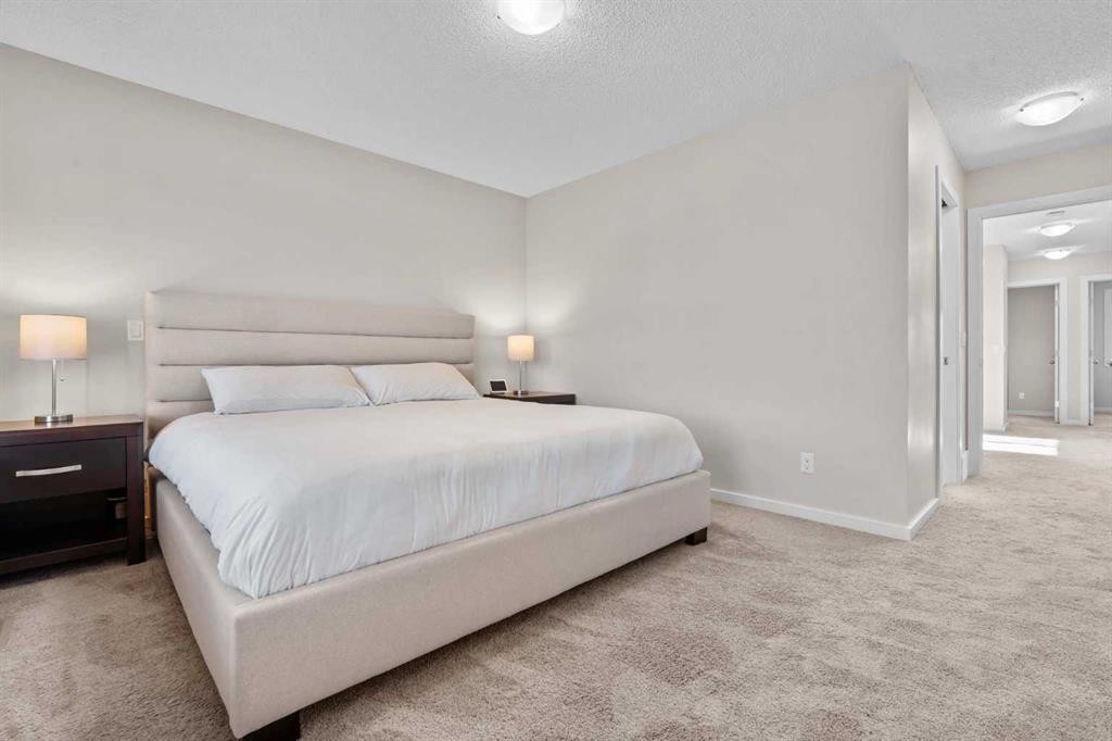 567 Evansborough Way Nw, Calgary, AB - Indoor Photo Showing Bedroom