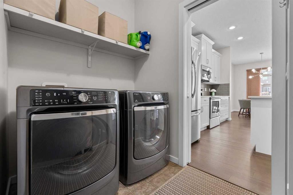 567 Evansborough Way Nw, Calgary, AB - Indoor Photo Showing Laundry Room