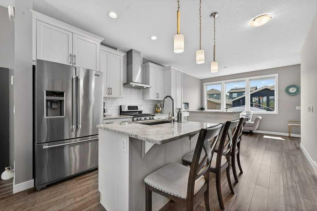 271 Fireside Drive, Cochrane, AB - Indoor Photo Showing Kitchen With Stainless Steel Kitchen With Upgraded Kitchen