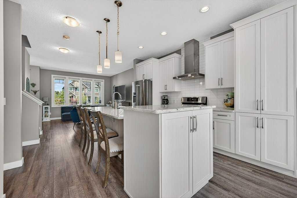271 Fireside Drive, Cochrane, AB - Indoor Photo Showing Kitchen With Upgraded Kitchen