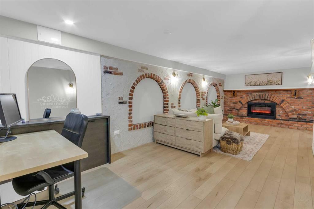 77 Hogarth Crescent Sw, Calgary, AB - Indoor With Fireplace