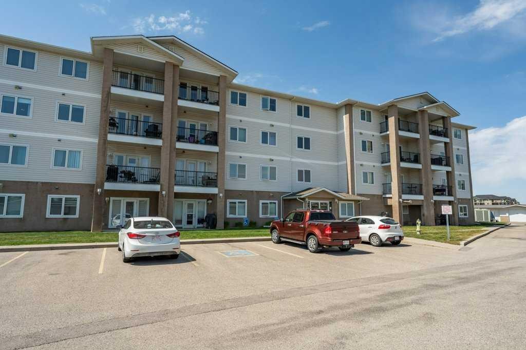 303-300 Edwards Way Nw, Airdrie, AB - Outdoor With Balcony With Facade