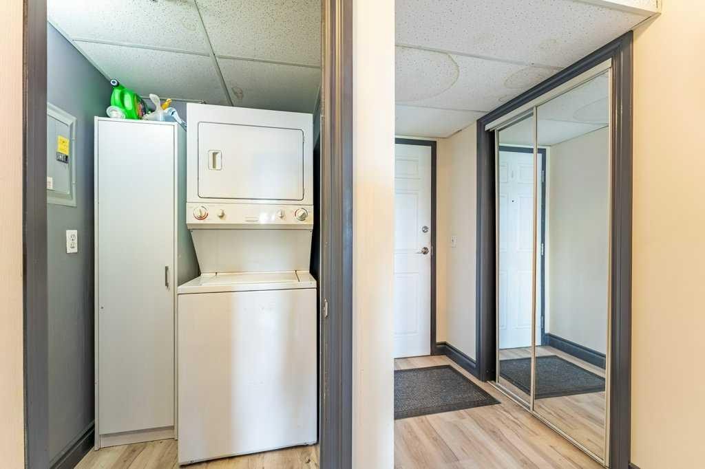 303-300 Edwards Way Nw, Airdrie, AB - Indoor Photo Showing Bedroom