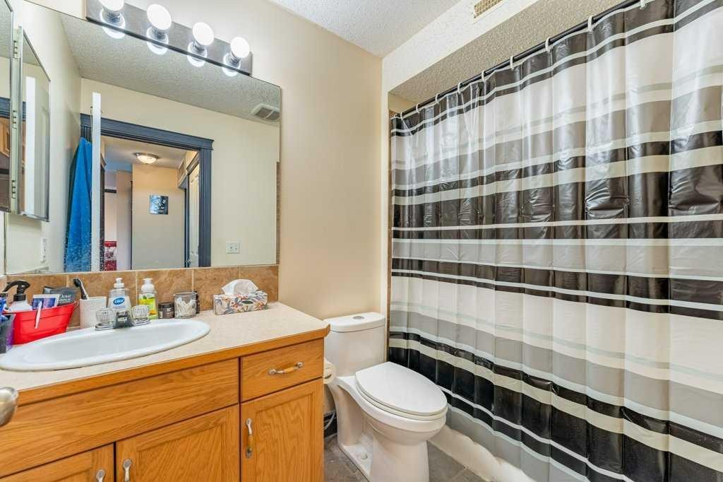 303-300 Edwards Way Nw, Airdrie, AB - Indoor Photo Showing Bedroom
