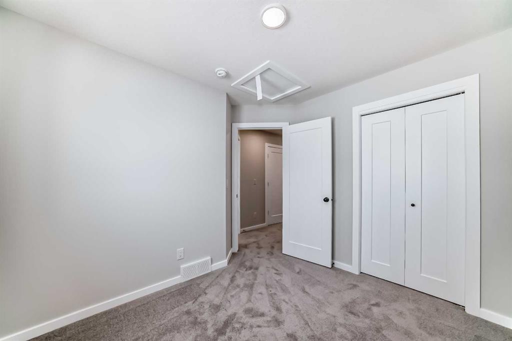 36 Savanna Place Ne, Calgary, AB - Indoor Photo Showing Other Room