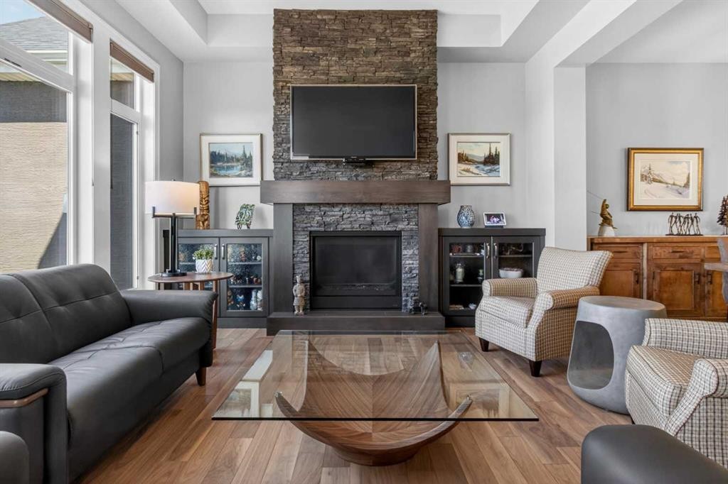 233 Spring Water Close, Heritage Pointe, AB - Indoor Photo Showing Living Room With Fireplace