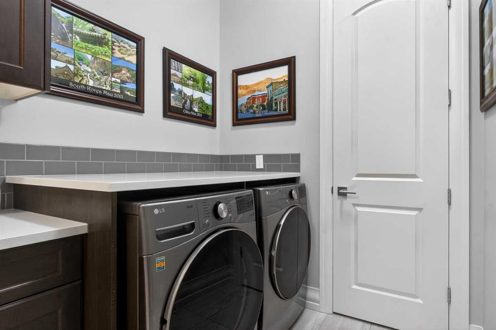 233 Spring Water Close, Heritage Pointe, AB - Indoor Photo Showing Laundry Room