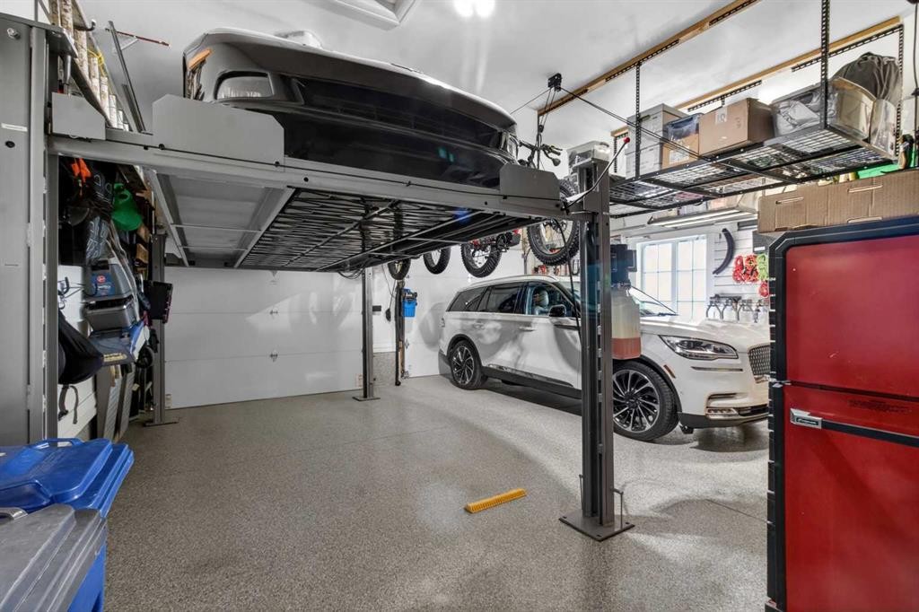 233 Spring Water Close, Heritage Pointe, AB - Indoor Photo Showing Garage
