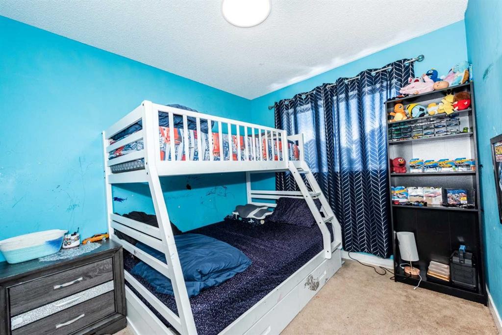 45 Martin Crossing Crescent Ne, Calgary, AB - Indoor Photo Showing Bedroom