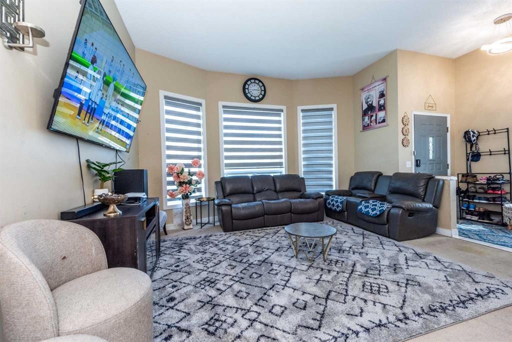 45 Martin Crossing Crescent Ne, Calgary, AB - Indoor Photo Showing Living Room